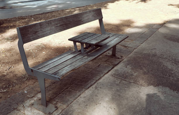 istock public bench with table in the center. 1198609297