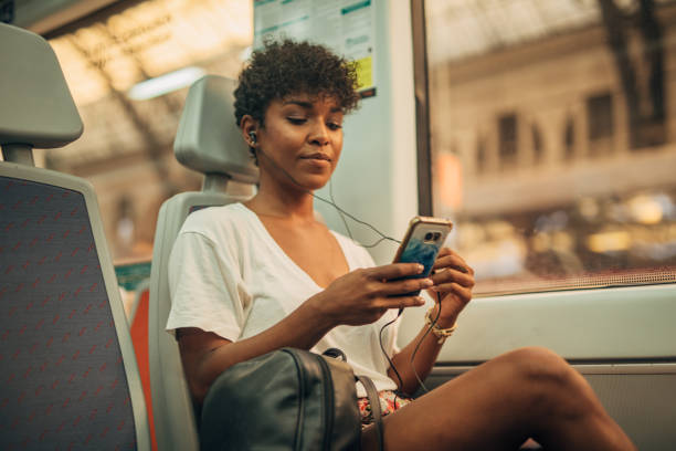 istock Pretty woman in train 1198609350