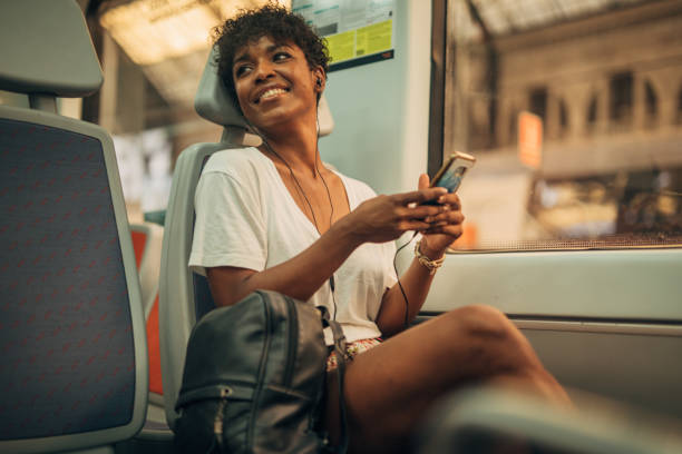 istock Pretty woman in train 1198609367