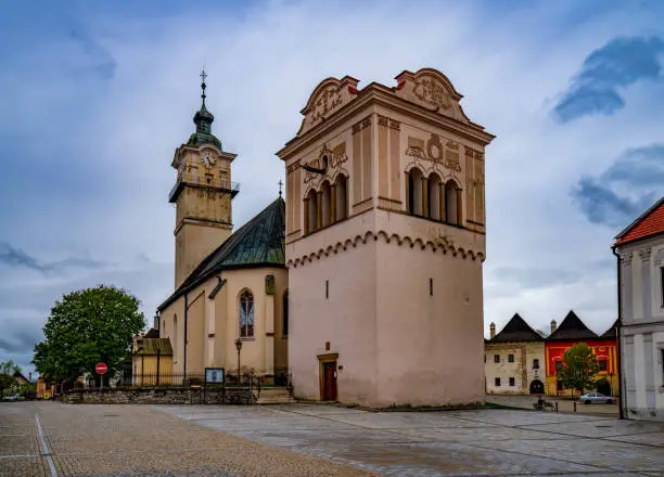 Photo of Gothic church and Renaissance bell tower in the main square of Spisska Sobota in Poprad, Slovakia