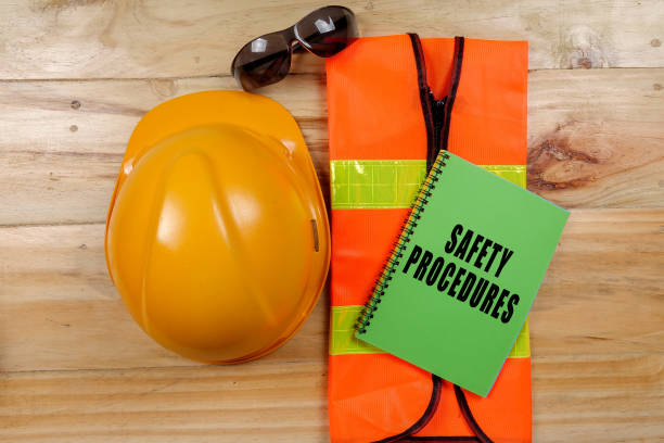 istock HEALTH,SAFETY & ENVIRONMENT CONCEPTUAL with general texts and standard construction safety equipment. 1198613920