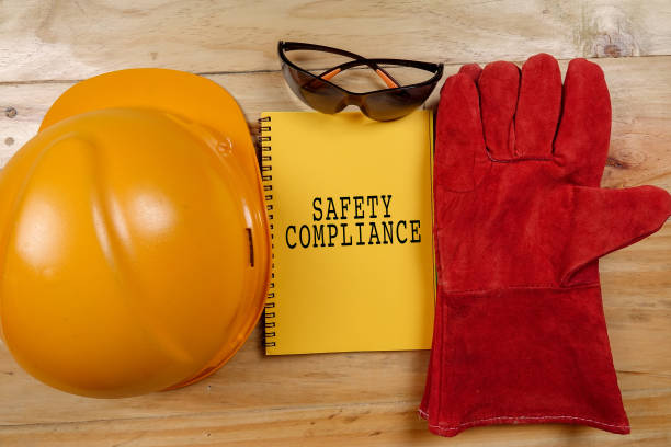 istock HEALTH,SAFETY & ENVIRONMENT CONCEPTUAL with general texts and standard construction safety equipment. 1198613952