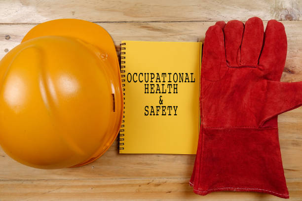 istock HEALTH,SAFETY & ENVIRONMENT CONCEPTUAL with general texts and standard construction safety equipment. 1198613981