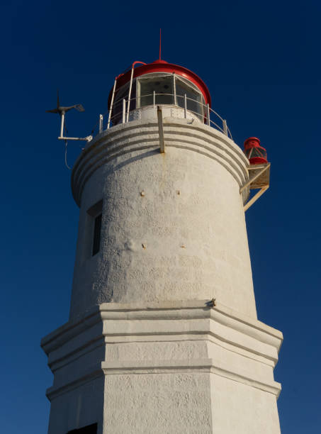 istock Tokarevsky lighthouse against the blue sky. 1198615658