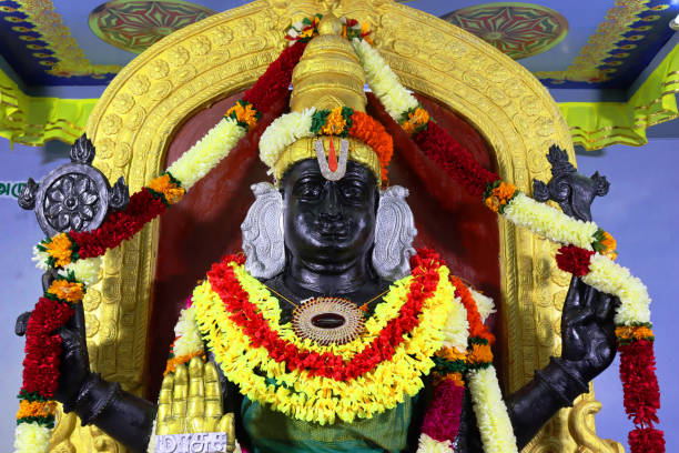istock Athivarathar statue in temple in South India 1198618481