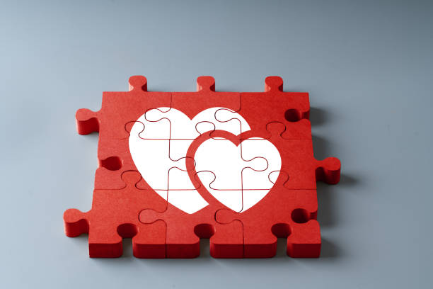 istock Anniversary, Wedding and Valentine day in puzzle concept top view 1198618576