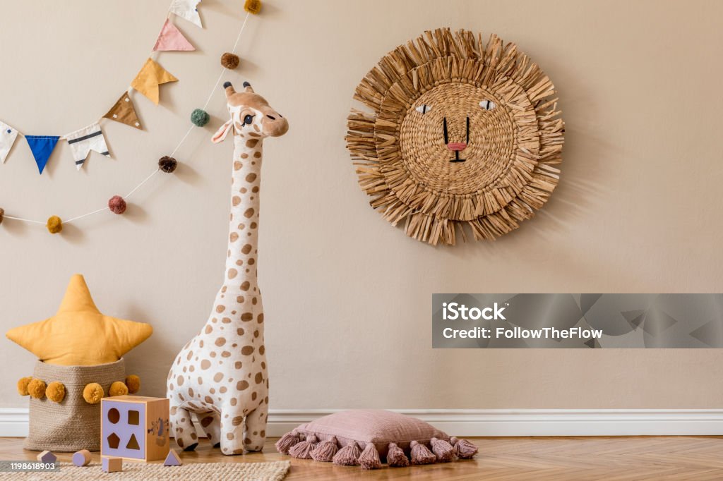 Stylish Scandinavian Interior Of Child Room With Natural Toys Hanging Decoration Pillows Plush Animals Teddy Bears And Accessories Beige Walls Interior Design Of Kid Room Template Copy Space Stock Photo - Download Stylish Scandinavian Interior Of Child Room With Natural Toys Hanging Decoration Pillows Plush Animals Teddy Bears And Accessories Beige Walls Interior Design Of Kid Room Template Copy Space Stock Photo - Download