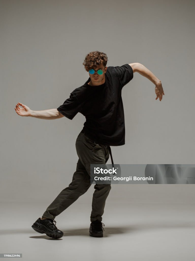 Neutral Dancing Guy Dancing Contemporary Dance In Studio Neutral Grey Background ...