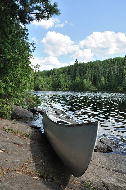 istock Canoe on the Shore of a Remote Wilderness Lake 119862377