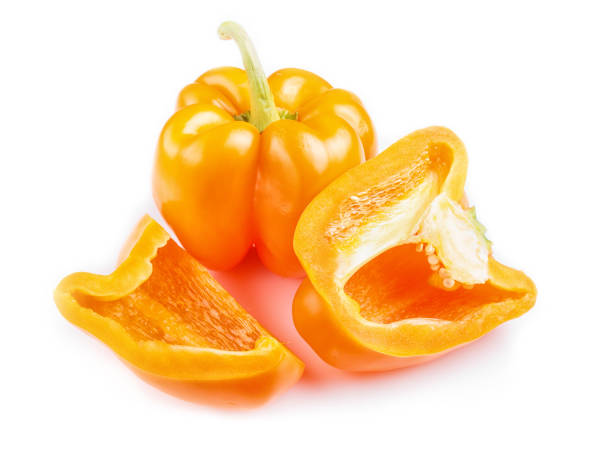 istock sliced yellow sweet peppers isolated on white background. closeup. 1198627529