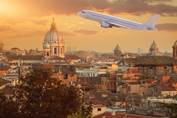 istock plane over the Vatican at sunny sunset 1198629347