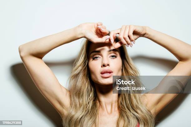 Glamour Portrait Of Beautiful Young Woman Stock Photo - Download Image Now - Shadow, Beauty, Fashion Model
