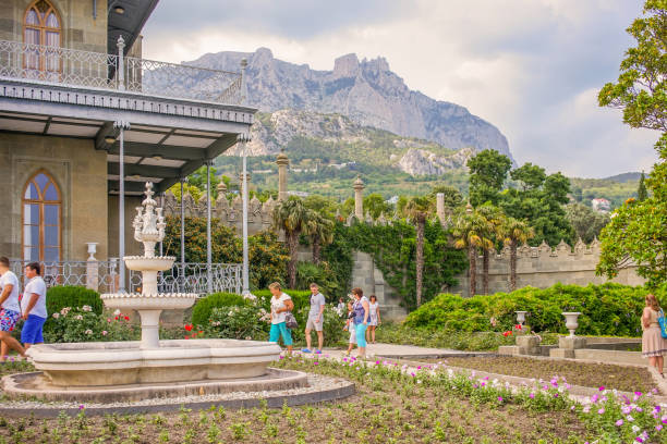 historical landmark - the Royal Palace. Yalta, Crimea-June 22, 2015: historical landmark - Vorontsov Palace. Tourists admire the old building. vorontsov palace stock pictures, royalty-free photos & images