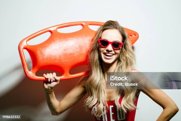 Summer Portrait Of Young Woman Holding Rescue Buoy Stock Photo - Download Image Now - Buoy, One Person, People