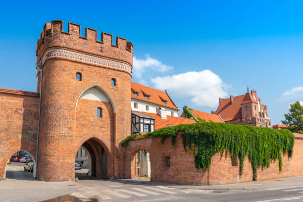 istock Bridge Gate (Polish: Brama Mostowa) from 1432 and city wall in Torun, Poland. 1198634852