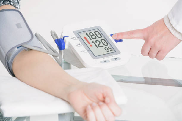 istock Doctor measuring blood pressure 1198635619