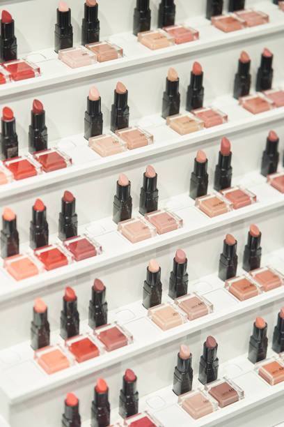 istock Lipstick nude shades. Rack with professional makeup for make up artists 1198636706