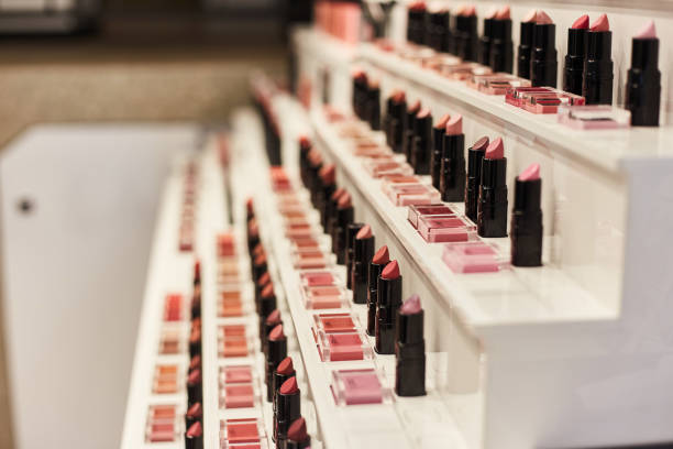 istock Lipstick nude shades. Rack with professional makeup for make up artists 1198636751
