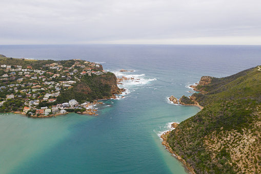 View over the famous Knysna Heads in South Africa. Ocean inlet into a large Estuary.