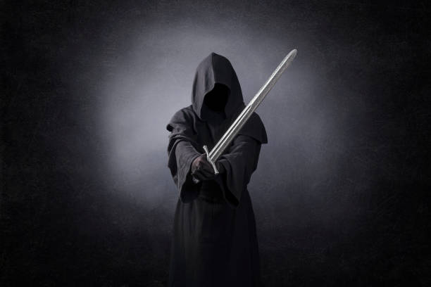 istock Ghostly figure with medieval sword in the dark 1198641269