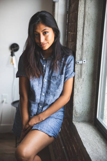 istock Relaxed woman posing at home 1198641512