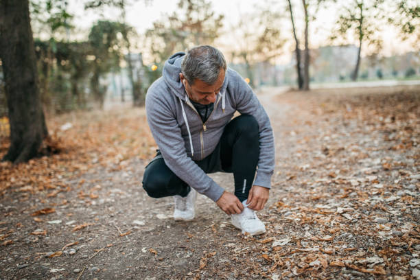istock Healthy living, jogging in a public park 1198644010