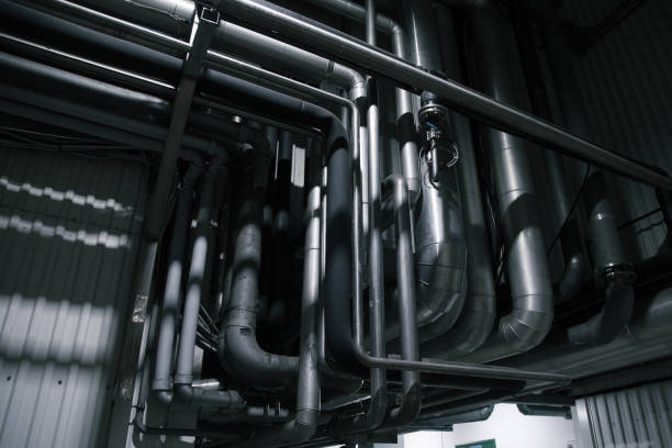istock Industrial steel pipes. Pipeline system for delivering components or for heating or ventilation etc 1198645282