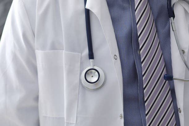 istock Doctor in medical gown 1198645438