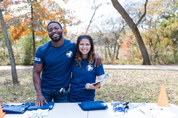 istock Cheerful couple volunteering together 1198645538