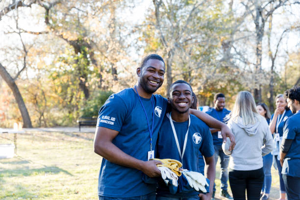 istock Father and son volunteering during cleanup event 1198645549