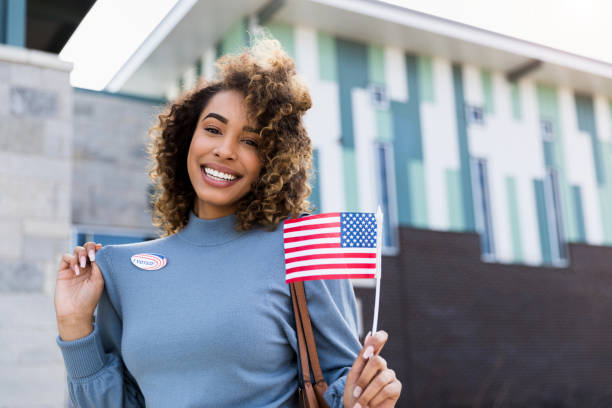 istock Woman smiles for camera and shows off 