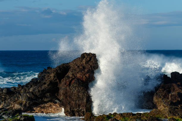 istock Crashing waves coming ashore at Hookipa Beach 1198649489