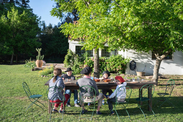 istock Multi-generation gaucho family dining outdoors 1198650261