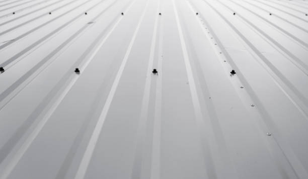 istock White Corrugated metal sheet texture surface of the wall. Galvanize steel background. 1198650351