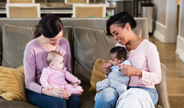istock Two new mothers and their babies 1198650513