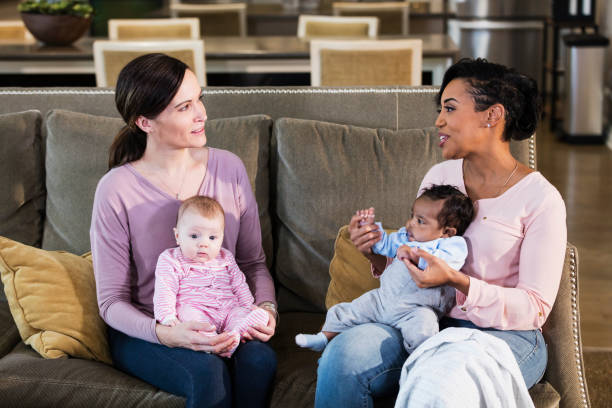 istock Two new mothers and their babies 1198650556