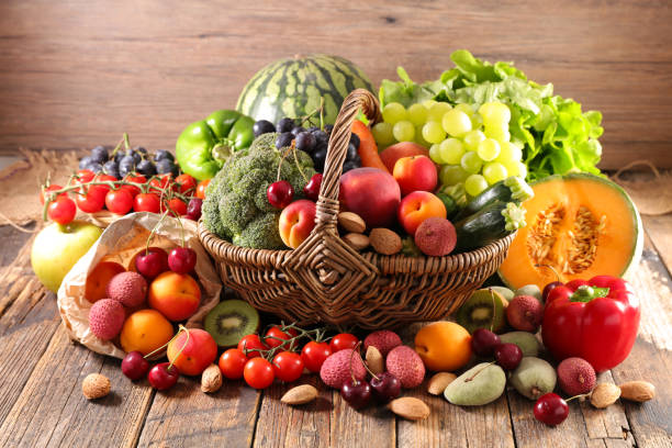 istock assorted of fruit and vegetable in wicker basket 1198651986