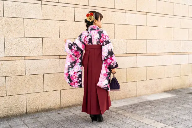 A woman wearing a hakama