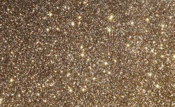 istock gold sparkle glitter Christmas festive background,  texture. Xmas abstract backgrop with copy space. 1198652140