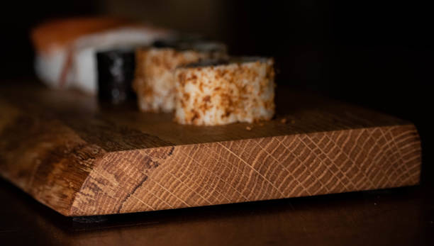 istock Sushi on a wooden platter 1198653291