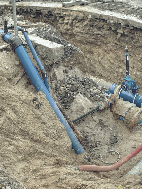 istock Blue water pipes and shut-off valve on pipe with branch 1198653389