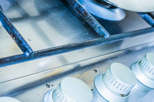 istock Close Up of Knobs on Quality Gas Stove 1198654230