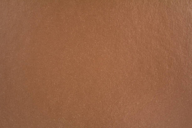 istock Closeup brown sheet of cardboard paper with rough surface texture background. 1198662073