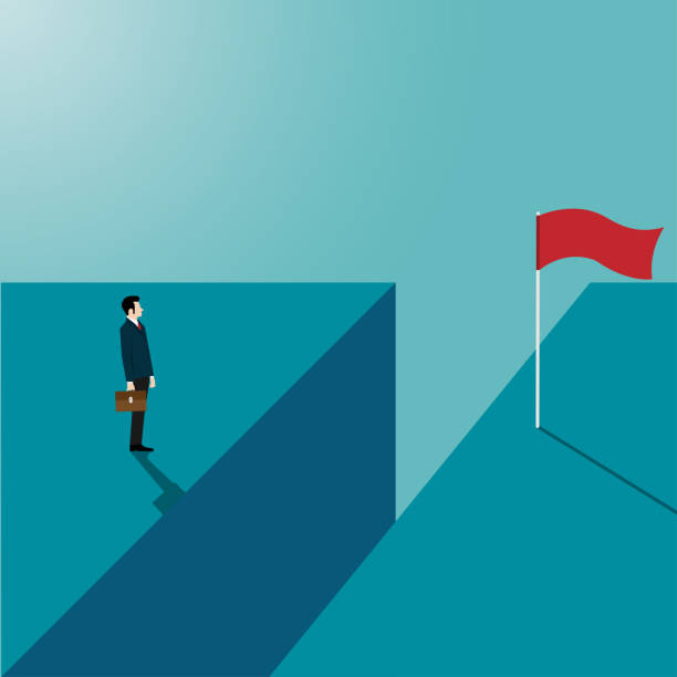 istock Businessman looking reach the other side of the cliff 1198668899