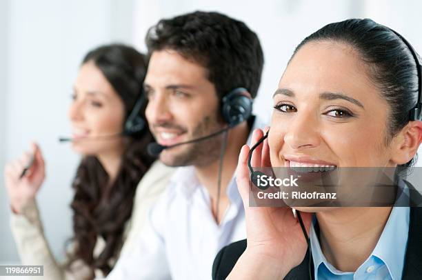 Callcenter Stockfoto und mehr Bilder von Am Telefon - Am Telefon, Attraktive Frau, Berufliche Beschäftigung