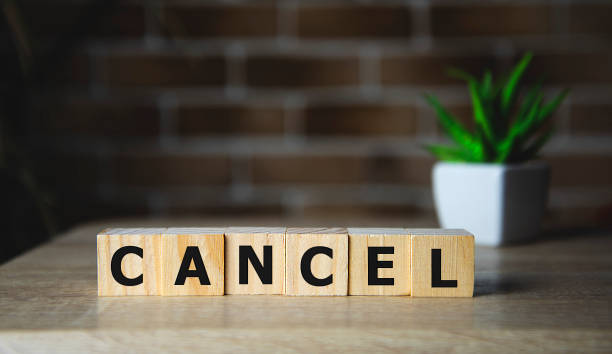 istock CANCEL word made with building blocks, business concept. 1198671893