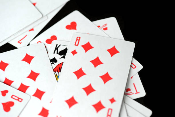 istock Playing cards on a black background close-up. Gambling Concept 1198677924