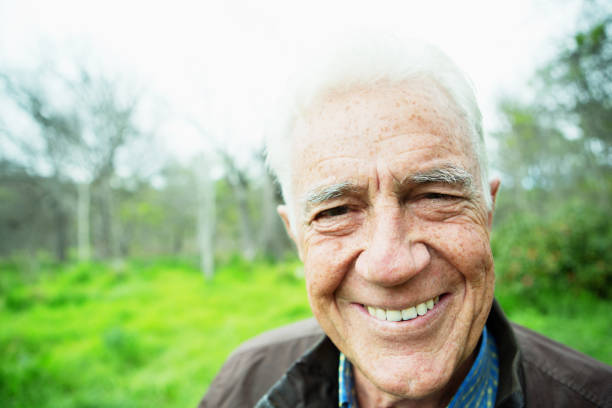 istock Smiling senior man in rural setting 1198681854