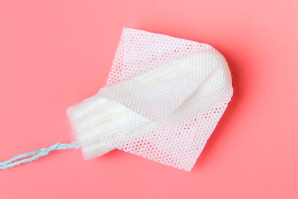 istock Menstrual tampon on a pink background 1198684441