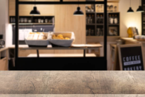 istock Wood table with blur kitchen room background .For montage product display or design key visual layout. 1198686036